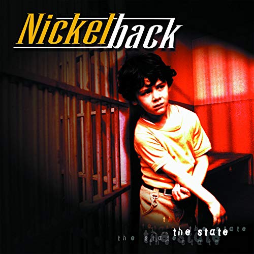 Album cover featuring a young boy standing in front of prison bars in red light.