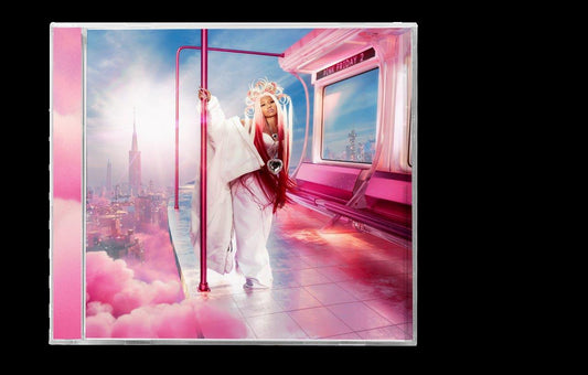 Nicki Minaj poses in a subway car with a pink and cloud-filled cityscape.