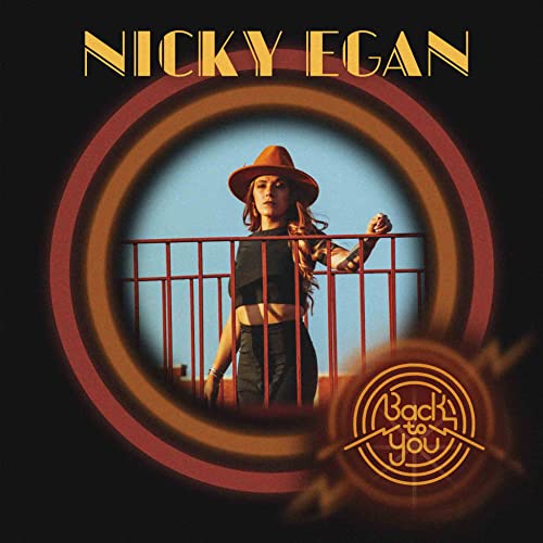 Vinyl record cover featuring Nicky Egan in a brown hat, looking away.