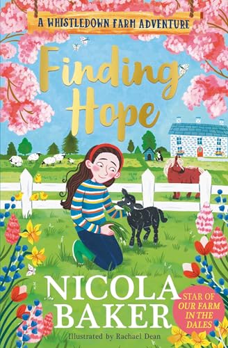 A girl in a striped shirt kneels in a meadow, feeding a black lamb.