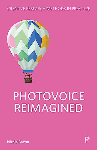 Book cover with a colorful hot air balloon on a pink background.