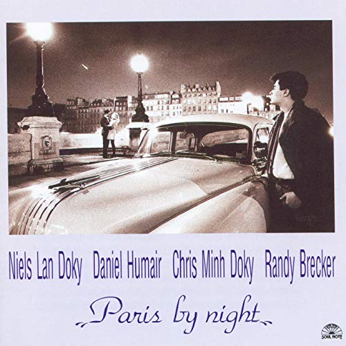 CD cover: vintage car, Parisian street scene, and musicians’ names.