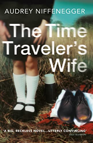 Book cover: "The Time Traveler's Wife" with a blurry couple and shoes.