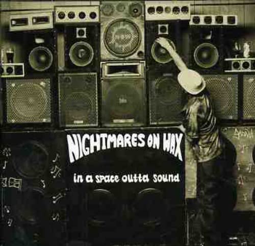 CD cover with stacked speakers and a silhouetted figure.