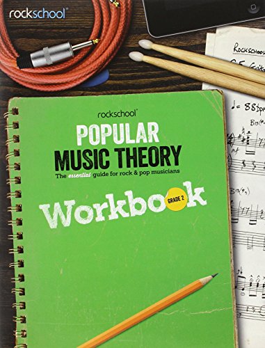 Green workbook titled “Rockschool Popular Music Theory Workbook Grade 2” with music notes.