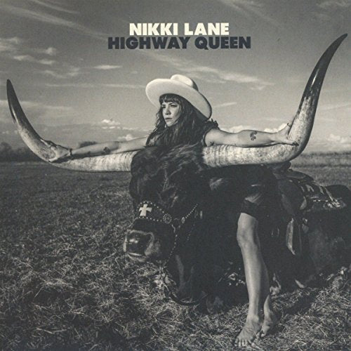 Black and white album cover of Nikki Lane posing with a longhorn steer.