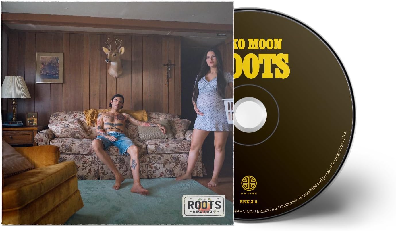 Niko Moon Roots CD cover featuring a couple in a wood-paneled living room.