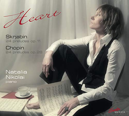 CD cover featuring pianist Natalia Nikolai seated with sheet music.