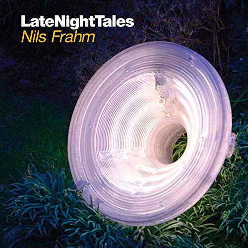 Album cover for Nils Frahm’s “Late Night Tales” with a glowing vinyl roll.
