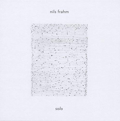 Album cover for Nils Frahm Solo featuring a textured grey rectangle on white background.