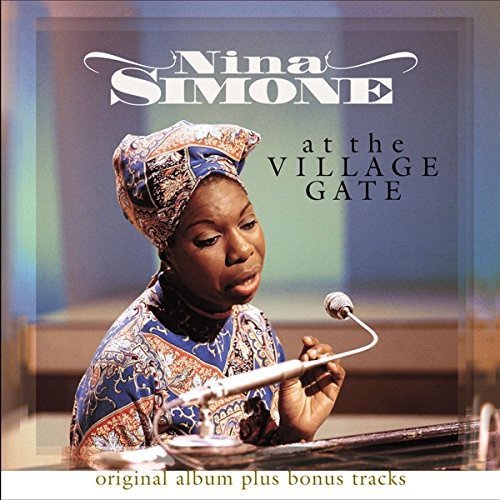 Nina Simone album cover featuring a woman in blue patterned dress playing piano.