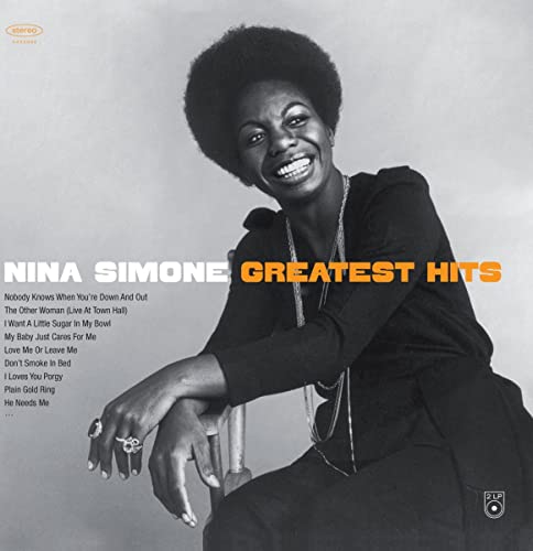 Black and white portrait of Nina Simone smiling, with album title and tracklist overlay.