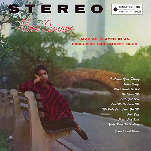 Nina Simone album cover, "Little Girl Blue," featuring Simone seated on a bench.
