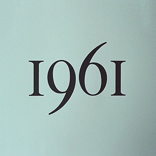 Close-up of album cover with large, black “1961” text on teal.