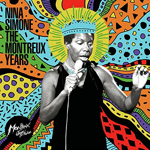 Nina Simone wearing a blue crown, holding a microphone against a colorful patterned background.
