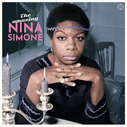 Nina Simone portrait album cover with candles and a blue headband.