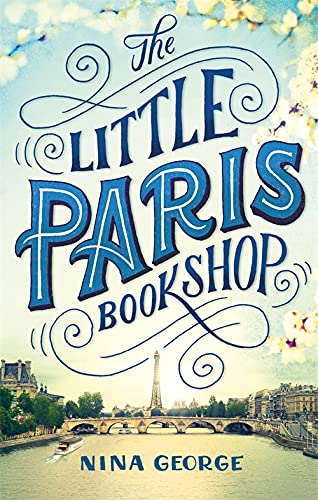 Book cover with blue title, Paris skyline, and falling blossoms.