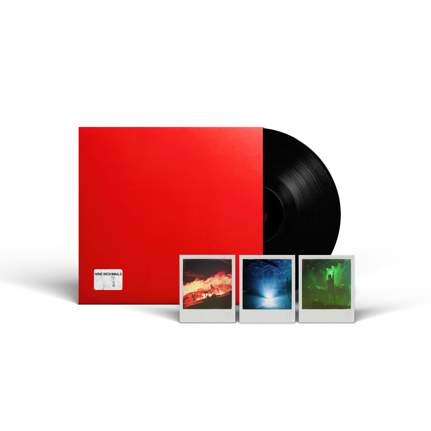 Red vinyl record sleeve with black disc and three Polaroid photos.
