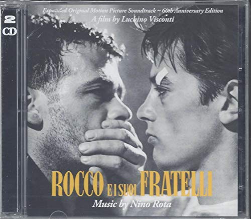 The image depicts a CD case featuring a black and white photograph of two men facing each other. The text on the cover reads 'Rocco e i suoi fratelli' in yellow, with 'Music by Nino Rota' written below. A concise alt text for this image could be: "CD case with black and white photo of two men facing each other."
