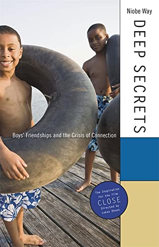 Two boys holding inner tubes on a wooden dock on the book cover.