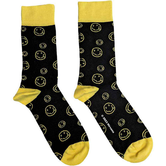 Ankle socks with repeated black outline drawings of smiling faces, UK size 7-11.