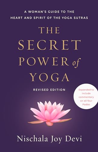 Book cover with purple background, gold text, and a pink lotus flower illustration.