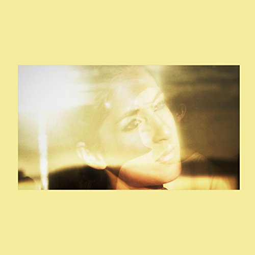 Blurred portrait of a woman, CD cover for Nite Jewel’s “Real High.”