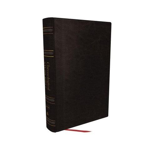 Black leathersoft Bible with gold spine detailing and a red ribbon marker.