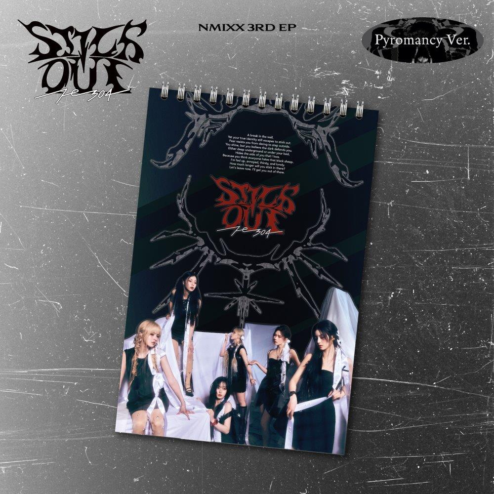 NMIXX album cover: group photo with spiderweb and fiery design.