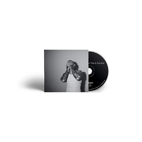 CD case with black and white portrait of a tattooed man.