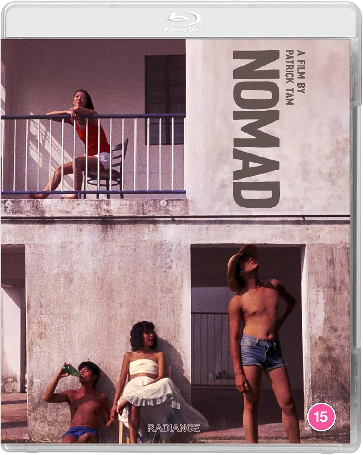 Nomad" Blu-ray cover featuring three people in front of a building.