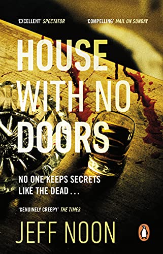 Book cover: “House with No Doors” with broken glass and liquid.