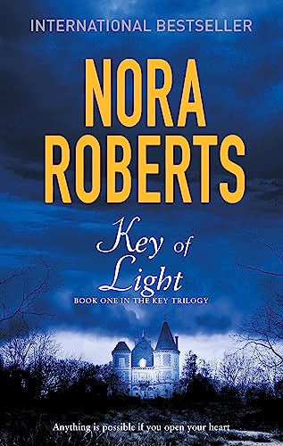 Book cover: “Key of Light” by Nora Roberts, featuring a shadowy castle.
