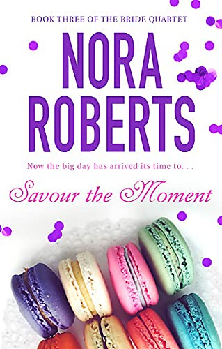 Book cover with author name, title "Savour the Moment," and colorful macarons.