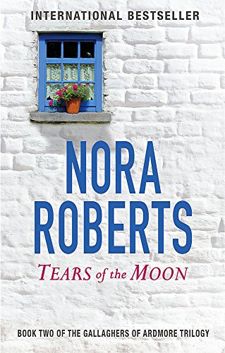 Book cover: white brick wall, blue window, large blue text "Nora Roberts".