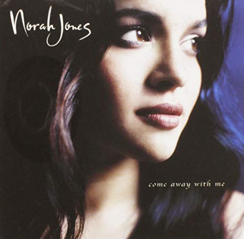Norah Jones album cover: close-up portrait of a woman looking left.