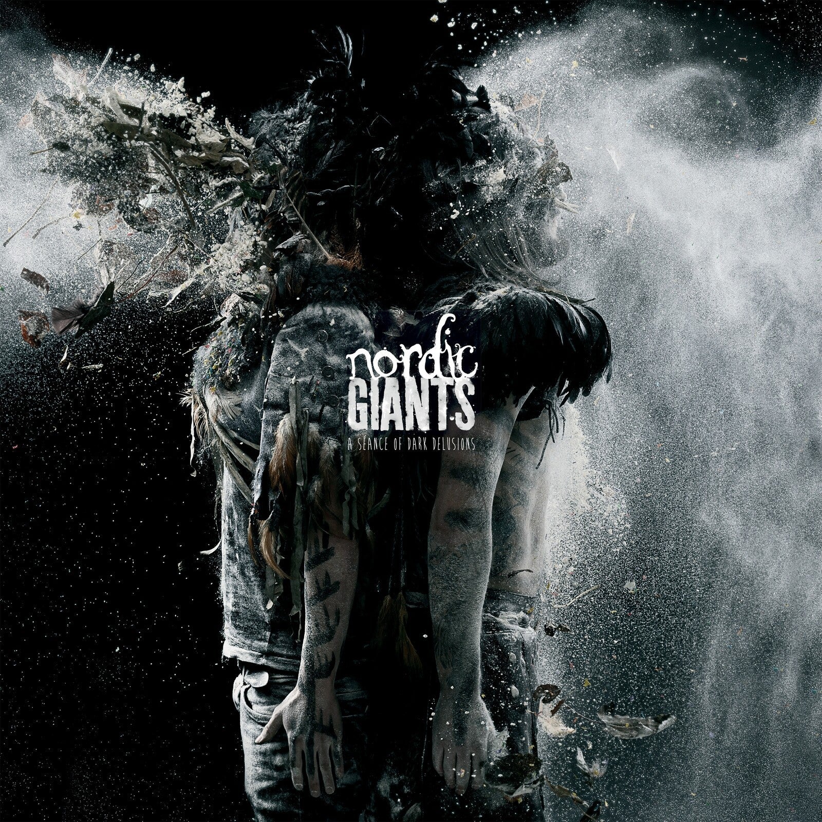 Dark, abstract album cover featuring a figure dissolving into particles.