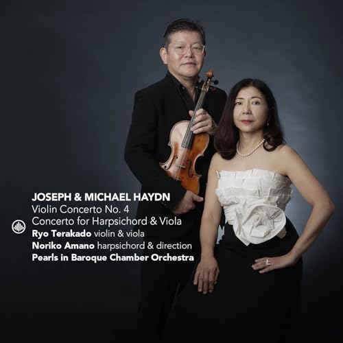 Two musicians, a man with a violin and a woman in a formal gown.