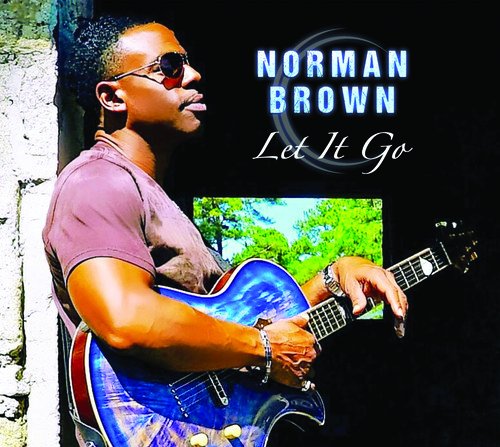 "Album cover with a man playing a blue guitar, outdoors, against a black background."
