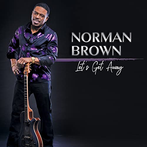 Norman Brown album cover featuring the artist with a guitar.
