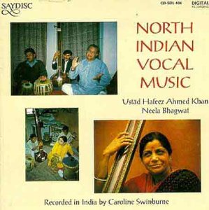 "CD cover with photos of musicians and title 'North Indian Vocal Music' on beige background."