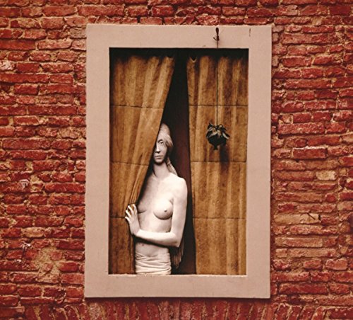 CD cover art: nude figure partially hidden behind draped fabric.