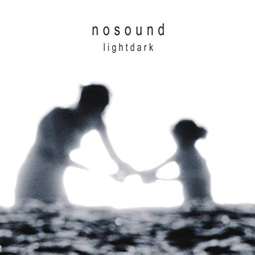 Nosound “Lightdark” CD cover: silhouetted figures reaching toward a bright orb.