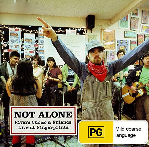 DVD cover for “Not Alone” featuring musicians performing indoors.