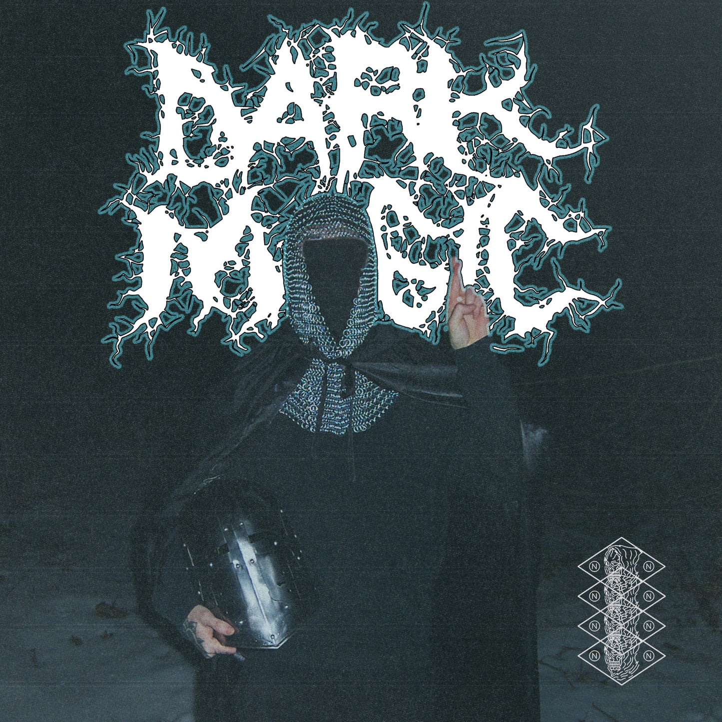 Figure in hooded robe with hand raised, album title "Dark Magic".