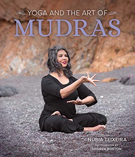 Book cover featuring a woman demonstrating mudras in a seated pose.