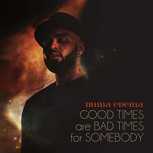 Album cover featuring a portrait of a man with a hat, against a fiery background.