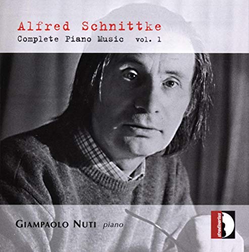 Black-and-white CD cover featuring a man's portrait with red and black text overlays.
