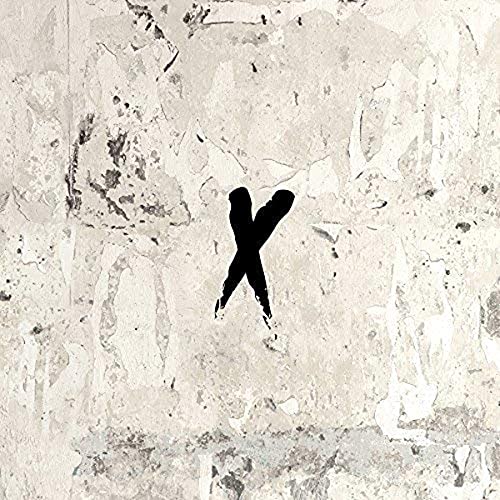 Nxworries "Yes Lawd!" vinyl album cover with a black, abstract "X" shape.