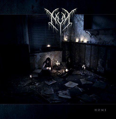 Dark album cover with two figures surrounded by lit candles in ruins.